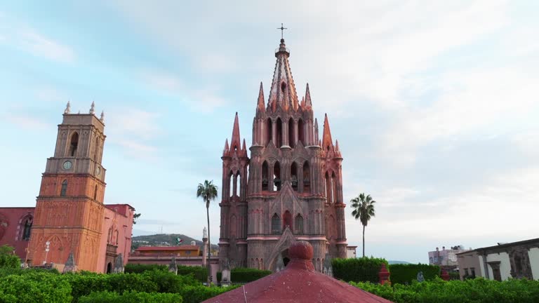 Revealing Shot of the Parroquia de San Miguel Arcangel and the Clock and Bell Tower in San Miguel de Allende