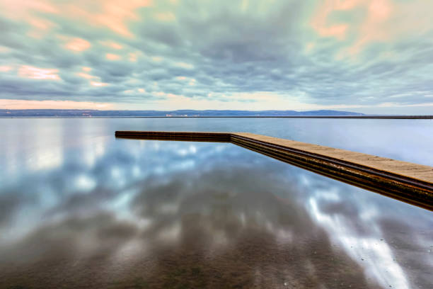 View of the sun setting over Marine Lake, West Kirby