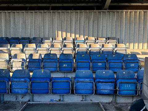 Seating in the derelict, Lea Bridge Stadium in Leyton east London. February 2024