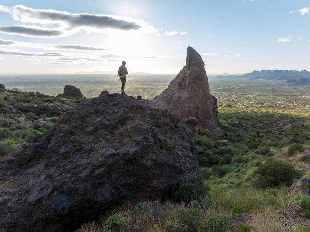 istock Mature couple explore rock ridge crest 2088938166