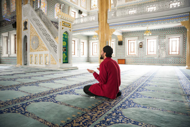 istock Muslim young man praying in the mosque 2088939219