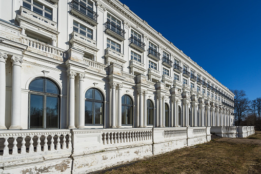 Jurmala,  Latvia - March 3, 2024: The building of the legendary resort hotel (also known as the former Kemeri sanatorium) rises above the park parterre like a white ship.