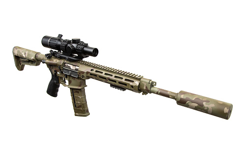 A modern carbine with an optical sight and a silencer. Weapons in camouflage coloring. Isolated on white background.