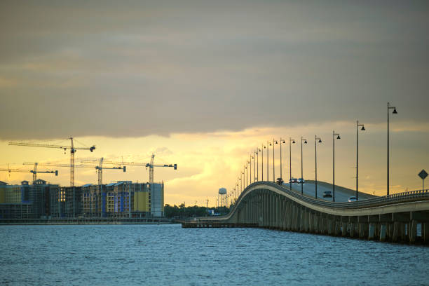 istock Barron Collier Bridge and Gilchrist Bridge in Florida with moving traffic. Transportation infrastructure in Charlotte County connecting Punta Gorda and Port Charlotte over Peace River 2089059311