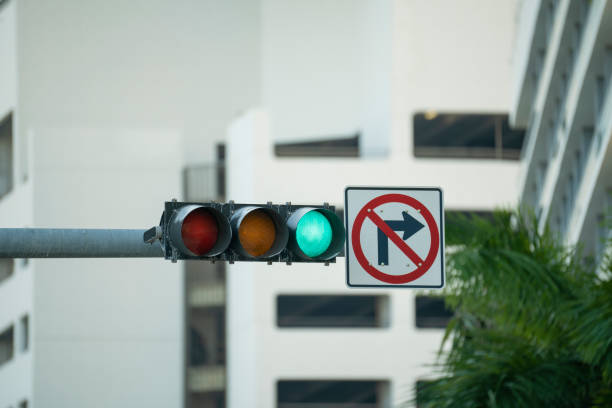 traffic lights for traffic regulation high above street in miami, florida - city of center control police mobility fotografías e imágenes de stock