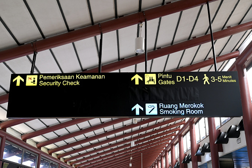Close-up of information board at an airport