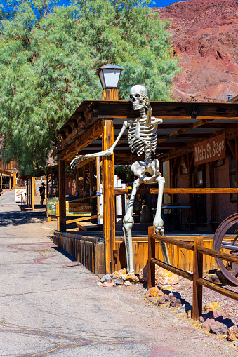 Calico Ghost Town,  California, United States - October 6, 2023: Skeleton at an old barn in Calico Ghost Town,  California