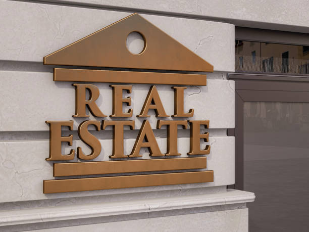 Bronze Real Estate Sign on Building's Wall. 3D Render