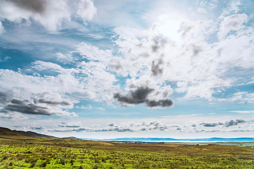 Blue sky background with prairie in Scotland, UK