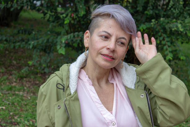 istock Middle aged woman posing in a public park 2089179958