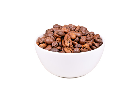 Roasting Arabica coffee beans in a light bowl isolated on white background
