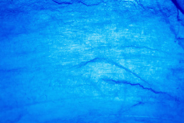Macro shot of blue marbled vinyl record. Surface of an old vinyl record. Shallow depth of field.