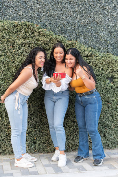 istock Young Friends Sharing a Laugh Over Smartphone Content 2089198270
