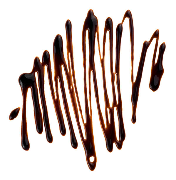 istock Hot melted chocolate isolated on a white background, top view. Chocolate syrup. Splashes of sweet chocolate sauce. 2089227029