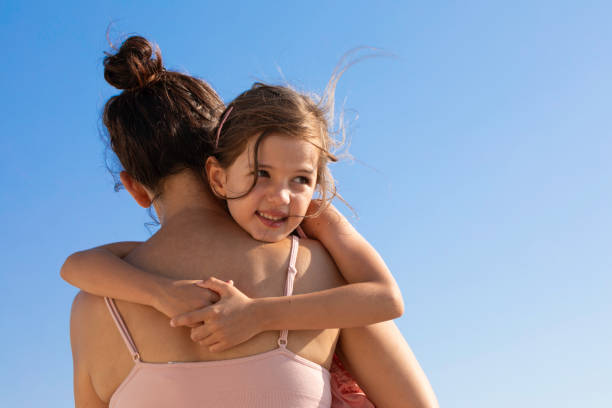 istock Warm Embrace Between Mother and Six-Year-Old Daughter 2089232224