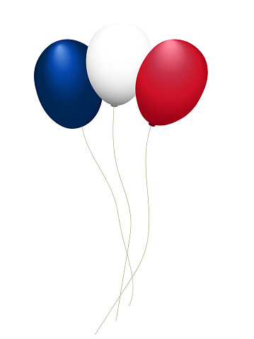 Balloons flying in the colors of the French flag, blue, white and red