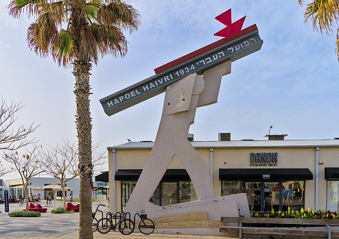 Tel Aviv Israel 04/07/2023 Statue of the Hebrew worker 1934 in the Tel Aviv port complex