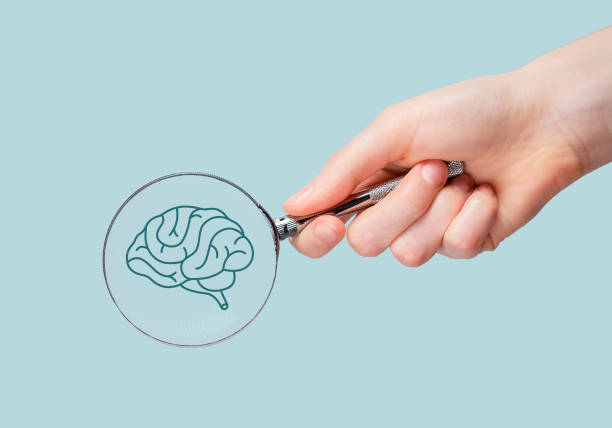 istock Neurology, brain health checkup, study through magnifying glass 2089277190