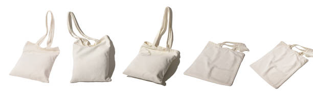 Tote bag mockup set. Natural textile shopper isolated on white Tote bag mockup set. Natural textile shopper isolated on white. tote bag mock up stock pictures, royalty-free photos & images