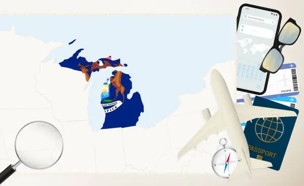 Vector illustration of Michigan map and flag, cargo plane on the detailed map of Michigan with flag.