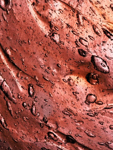istock Abstract color copper texture with water droplets close-up. 2089347535