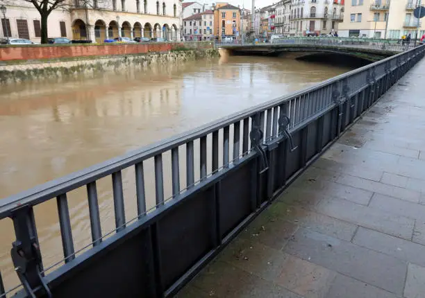 metallic bulkheads to protect Vicenza City in northern Italy during the flood in winter