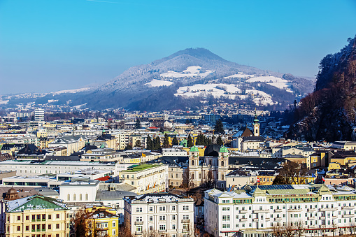 Salzburg, Austria - 01.13.2024: View of the historic city of Salzburg from the Festung mountain in winter, Salzburg Land.