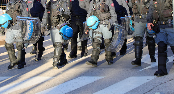 Vicenza, VI, Italy - January 20, 2024: Italian police in riot gear during the protest demonstration with helmets and shields