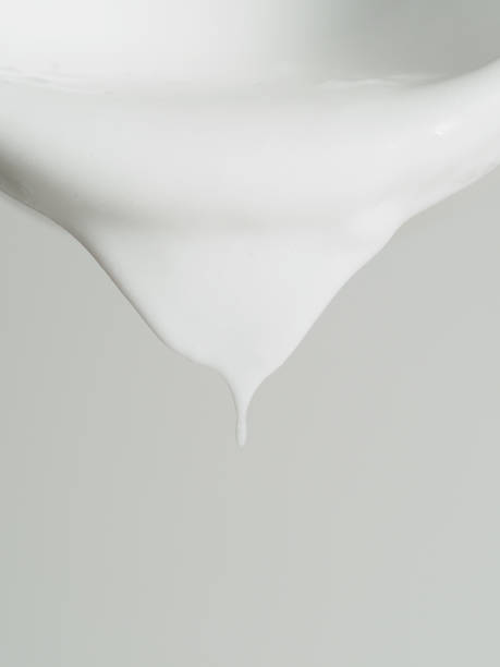 istock Macro Shot of White Paint Dripping from Bowl Edge 2089418929