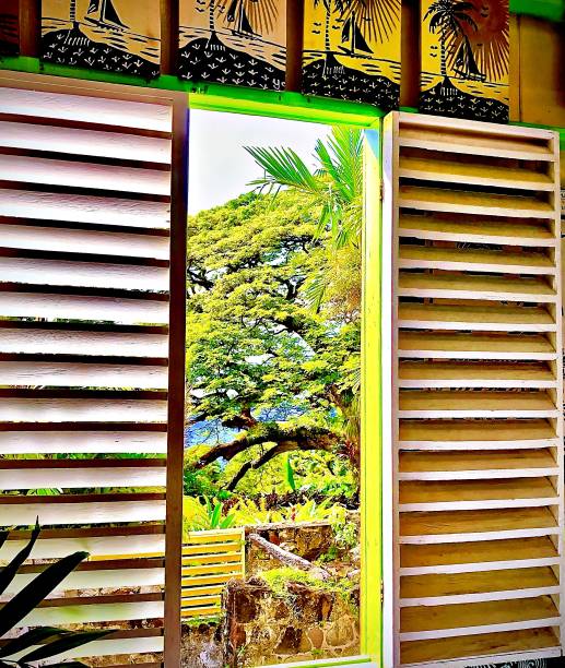 caribbean plantation shutters and batik - trade winds imagens e fotografias de stock