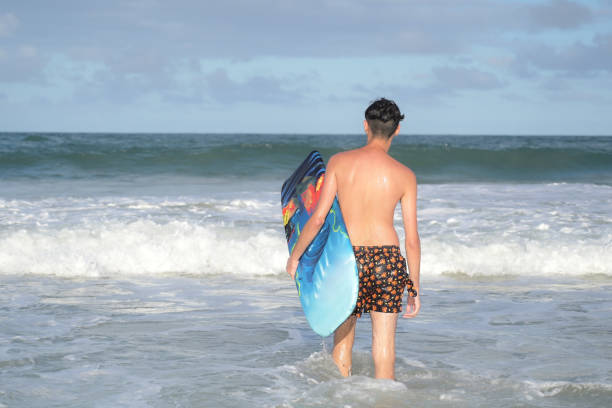 young man in the sea