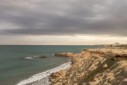 Stormy sky on La Zenia beach in Alicante. Spain.