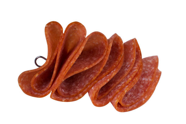 Salami smoked sausage slices on background