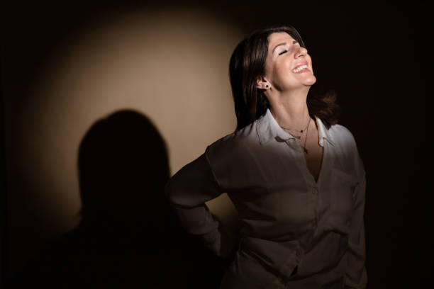 istock Middle aged brunette woman under spot light 2089603853