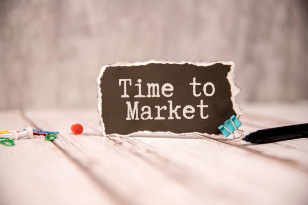 istock torn black paper and Time to Market text 2089837467
