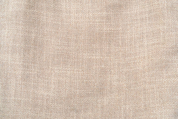 hessian sackcloth woven jute burlap fabric cloth textile texture pattern background in brown beige aged color - sack burlap burlap sack bag photos et images de collection