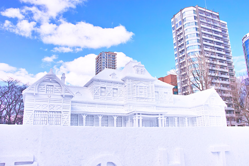 Sapporo, Hokkaido, Japan - February 9, 2024: Sapporo Snow Festival with blue skies, snow sculptures at the old Sapporo station.
