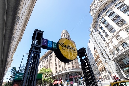 Buenos Aires, Argentina. jan 27, 2024 -  Buenos Aires Underground sign (Subte de Buenos Aires) Subway public transportation sign with buildings on the back