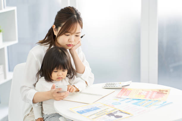 istock A woman choosing lessons for her child 2090154477