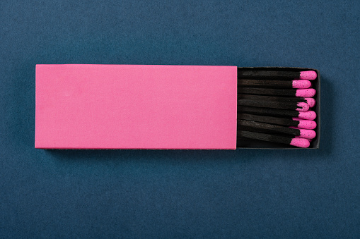 Pink eraser on white background with eraser residue