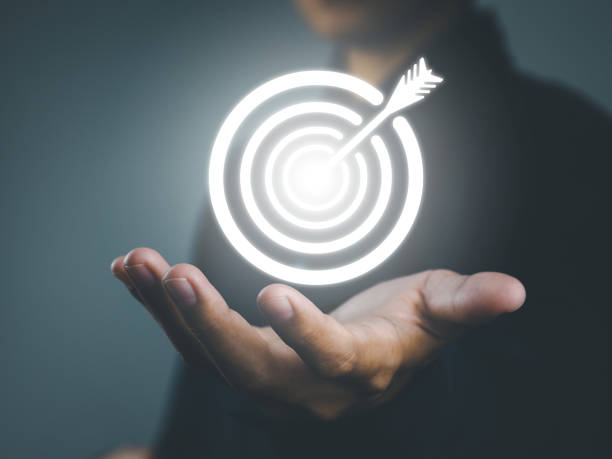 istock Businessman holding business target icon 2090216942
