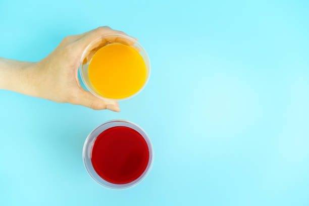istock Cup of orange and cherry juice. 2090245614