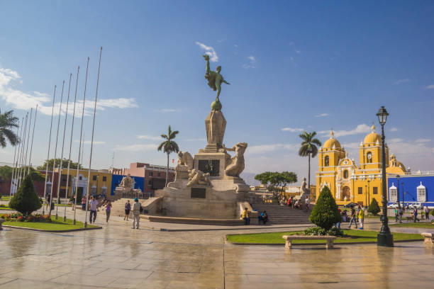Plaza de Armas, the town center of the city of Cusco, Peru. Tourists walking around the busy square.