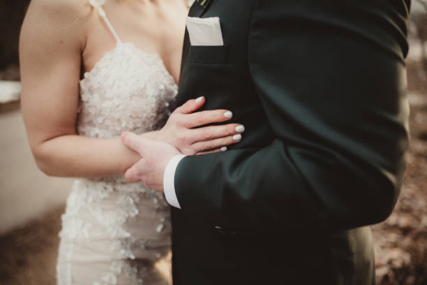 istock Bride and groom embracing each other on their wedding day 2090324351