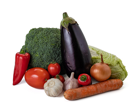 Fresh and organic vegetables on white background.