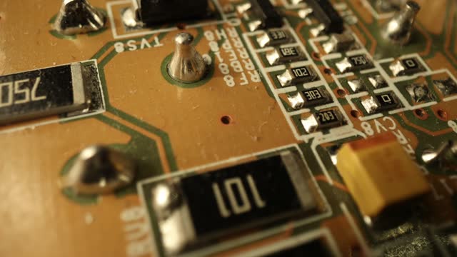 Smooth slow pan of electronic boards and componenets 4K Video