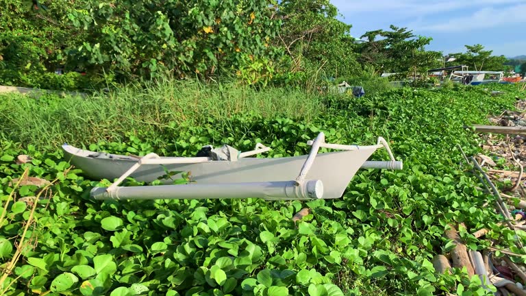 Wooden fishing boat parking on the beach