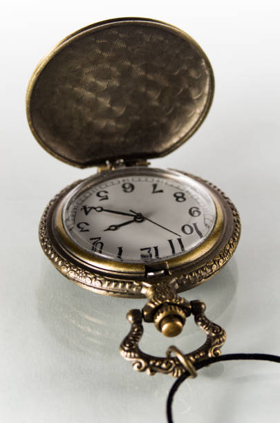 Single vintage pocket watch on white background