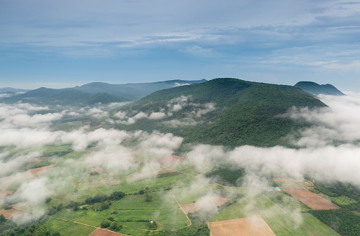 Aerial drone photographs of Krathing Mountain, also known as Khao Krathing. Thailand's Nong Ya Plong District, Phetchaburi, is surrounded by a sea of mist.