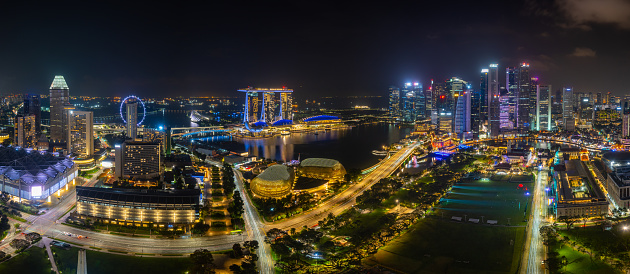 Aerial View of the Marina Bay District of Singapore with Illuminated Streets